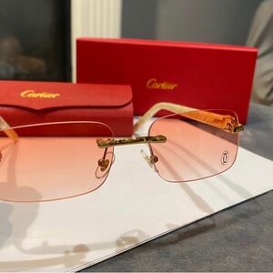 Cartier Women's Gold and Pink Glasses